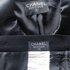 Chanel Boutique suit, jacket/skirt, button detail.